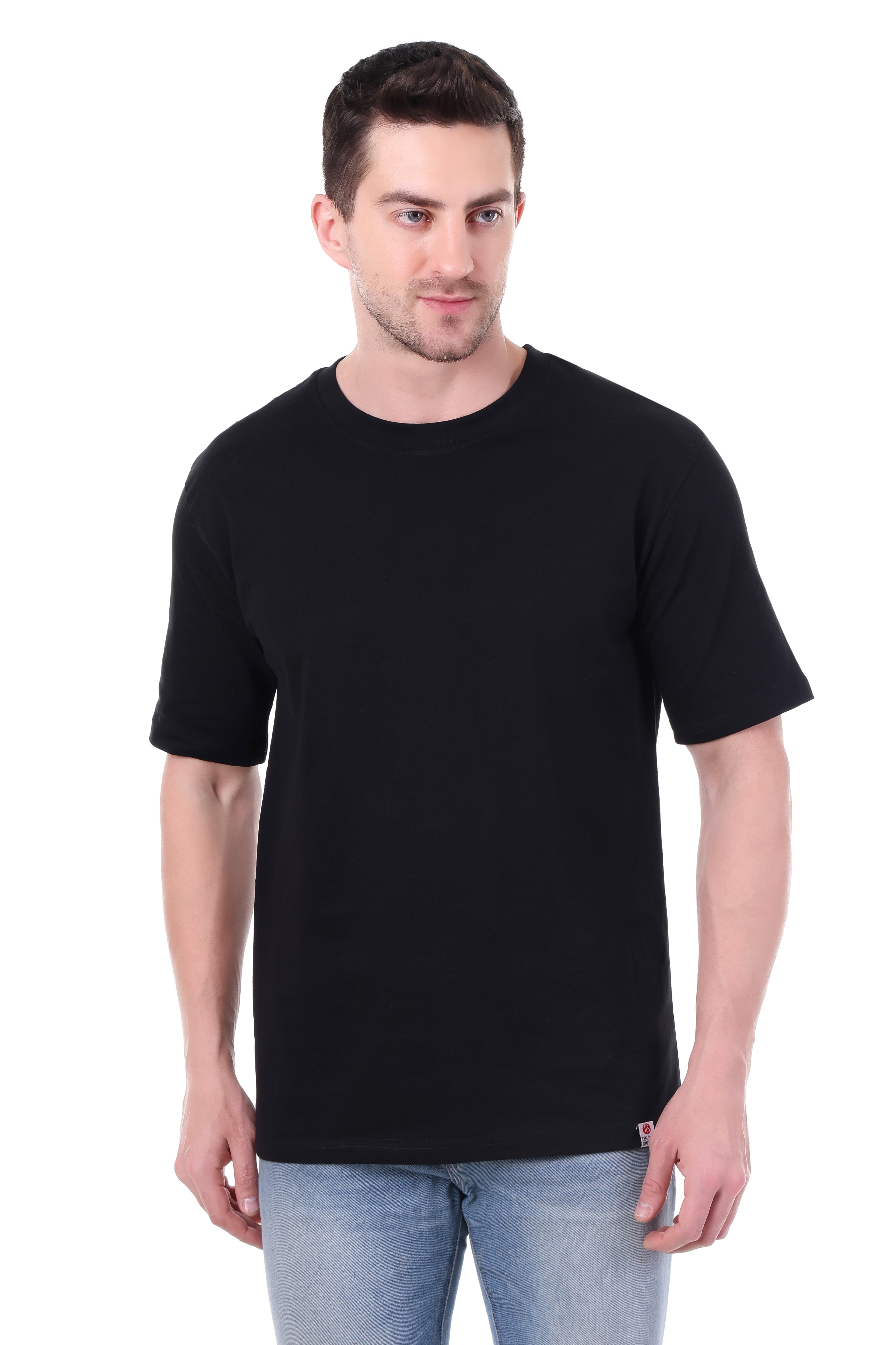 Front view of Tin Brother solid black oversized t-shirt – unisex cotton tee
