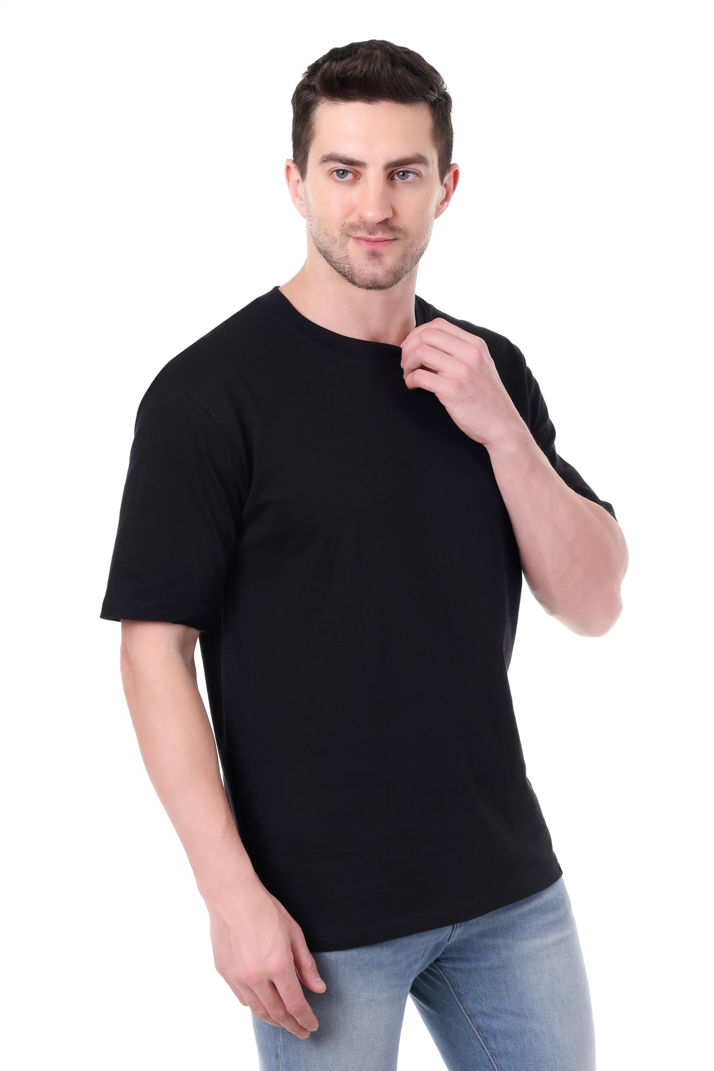 Side view showing drop shoulder and fit of Tin Brother black oversized tee