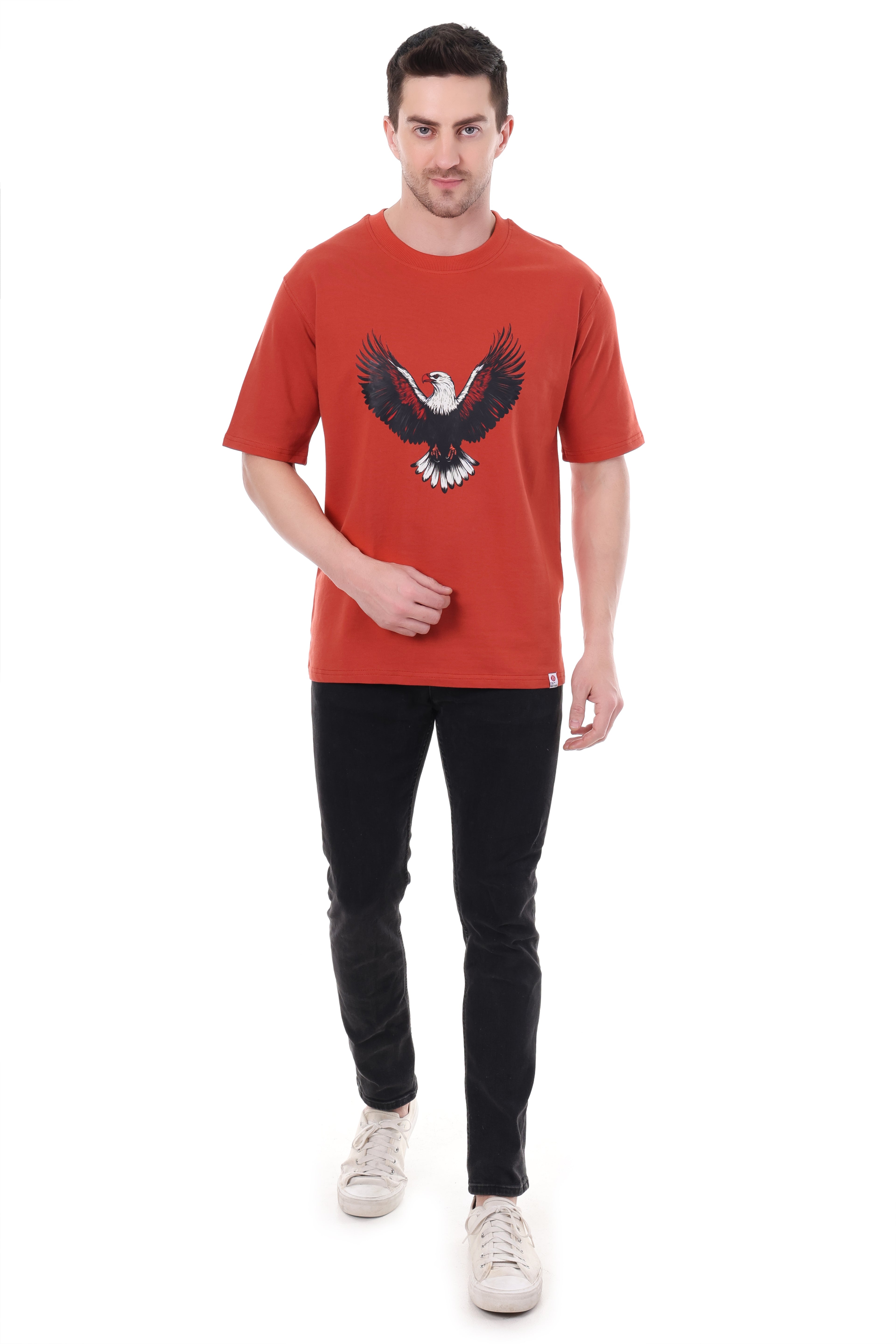 Flat lay display of Tin Brother 240 GSM oversized t-shirt with eagle graphic print