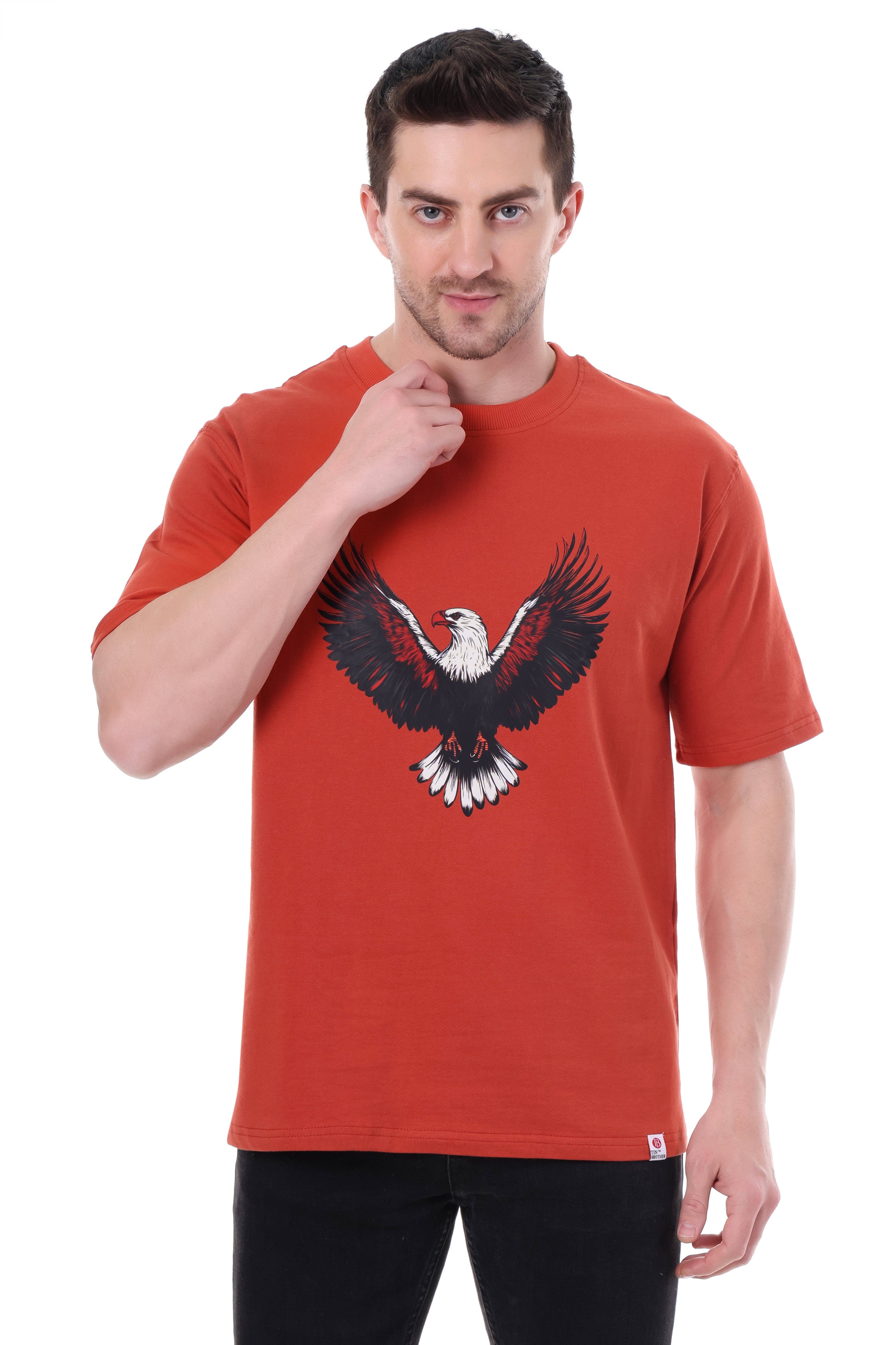 Front view of Tin Brother Eagle graphic t-shirt in rust red color – oversized unisex fit