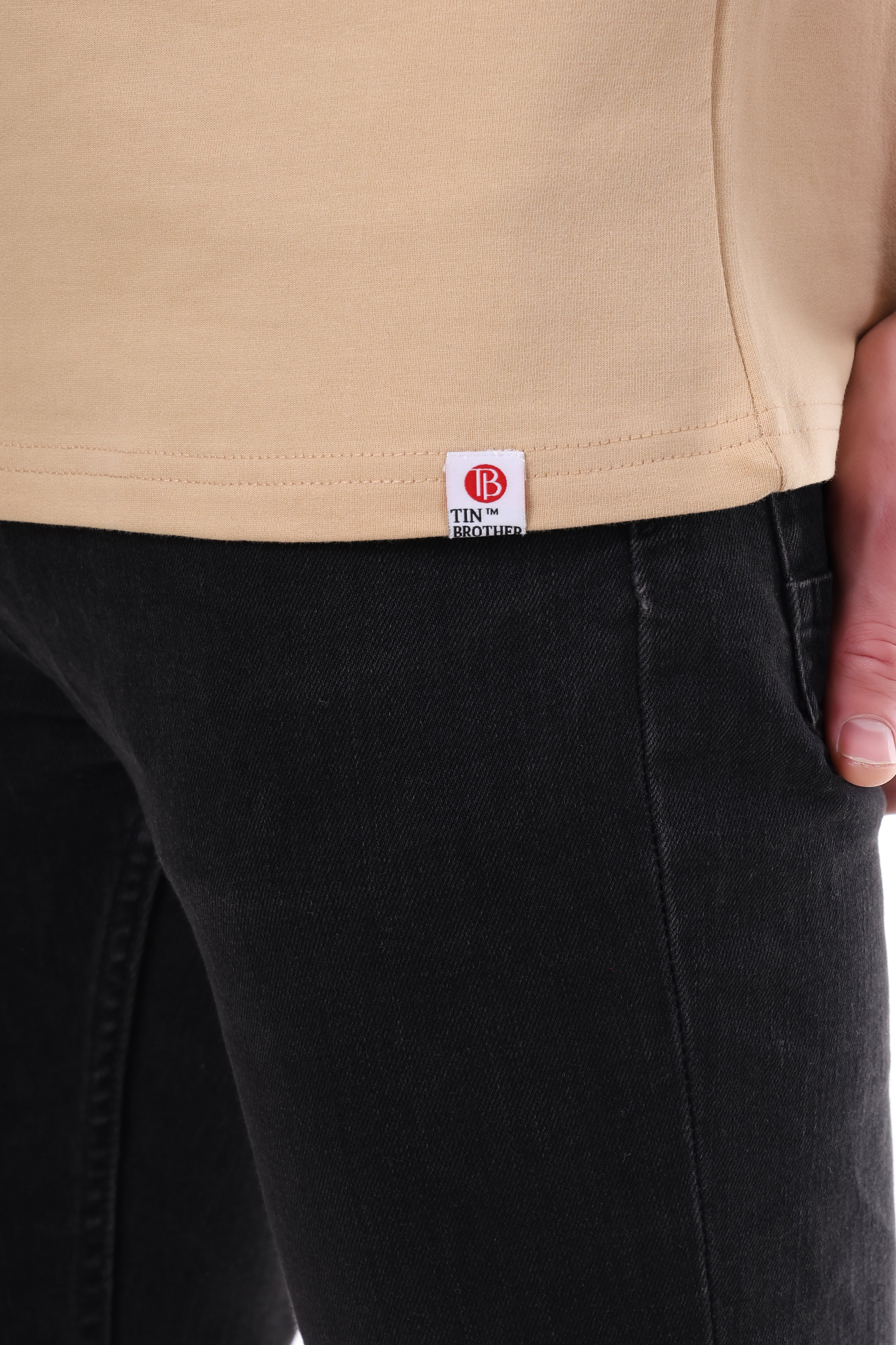 "Tin Brother logo tag on solid beach premium t-shirt"