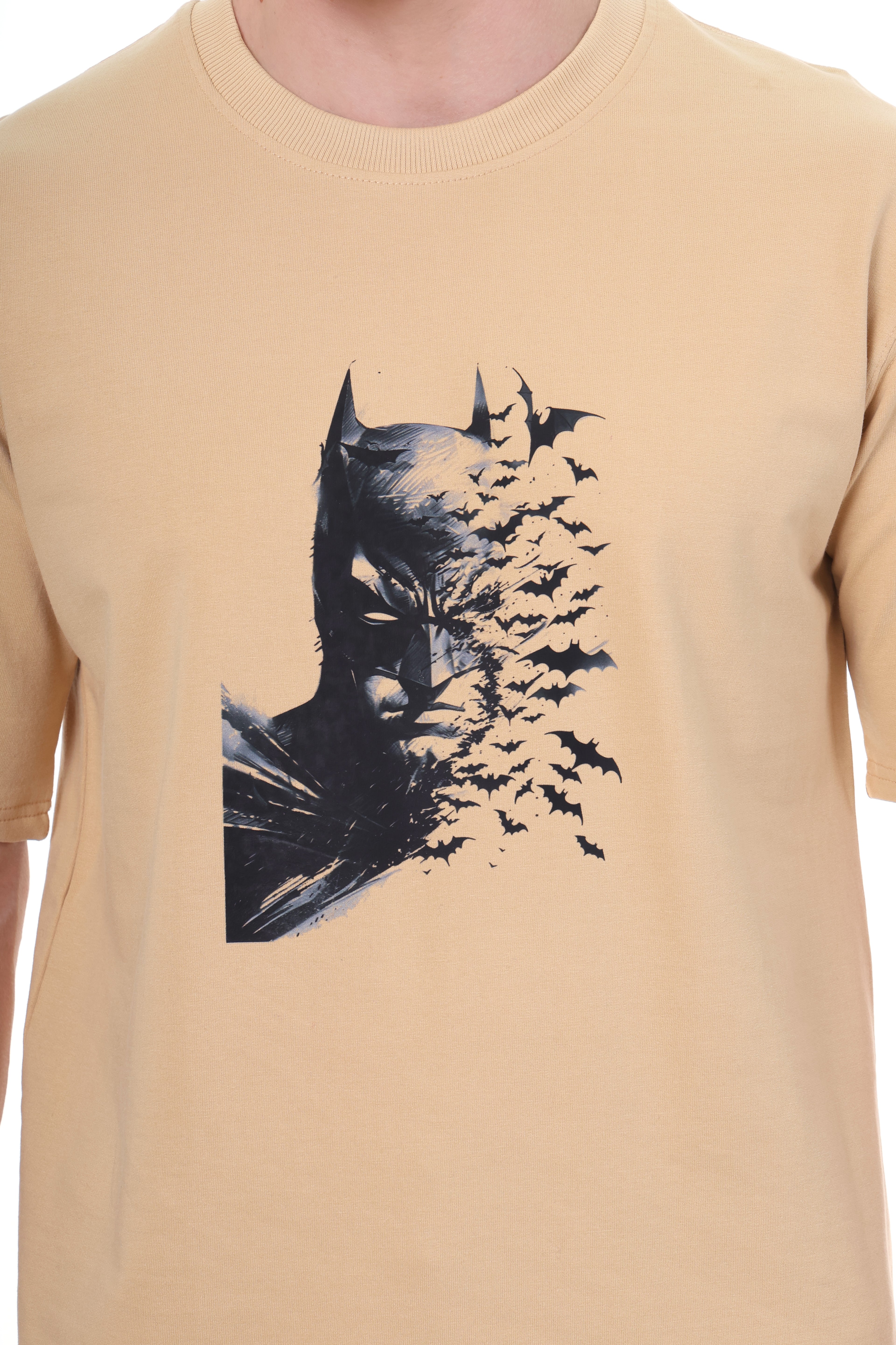 "Close-up of Batman print on beach tone cotton t-shirt"