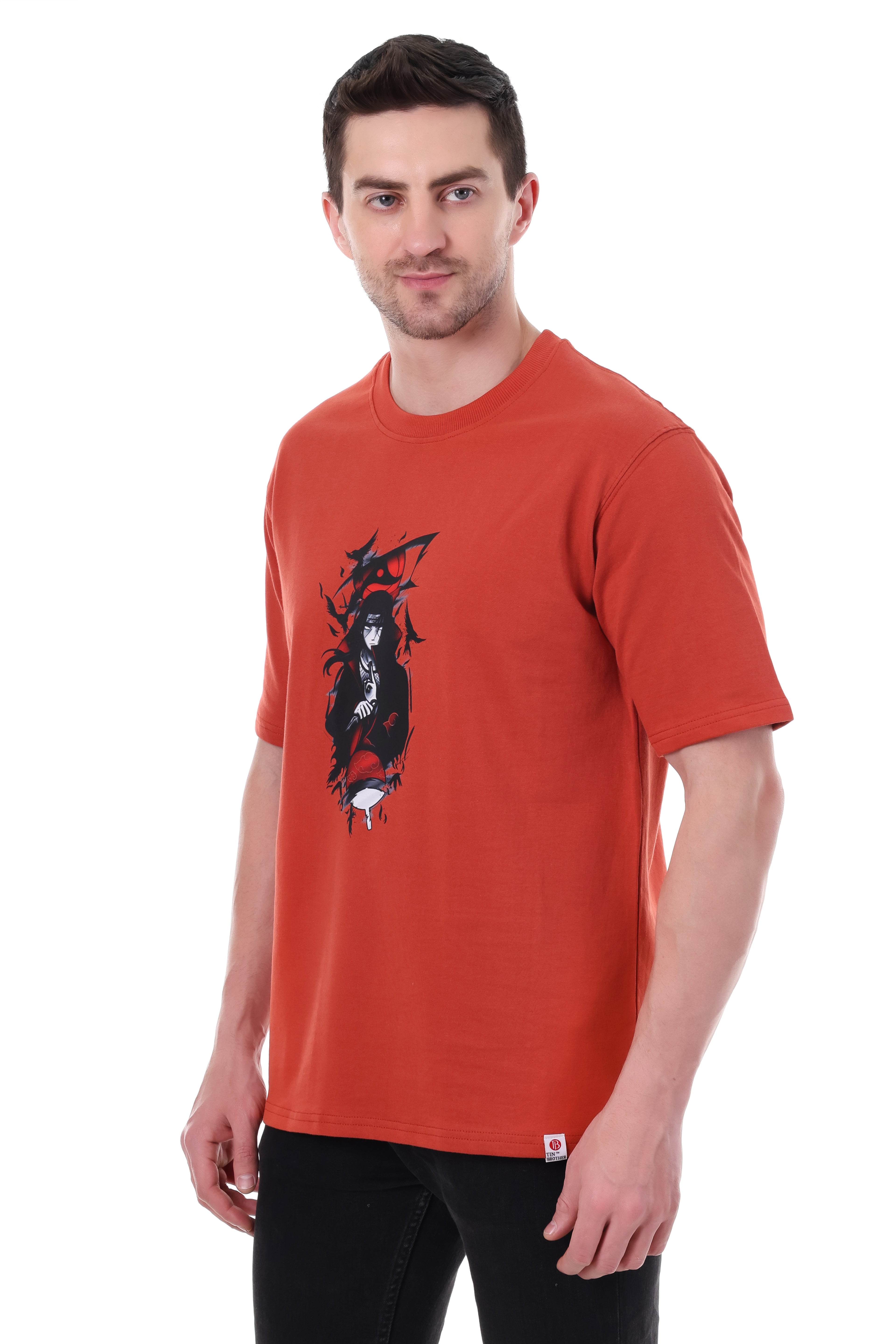 "Side angle of red oversized anime tee in terry fabric"